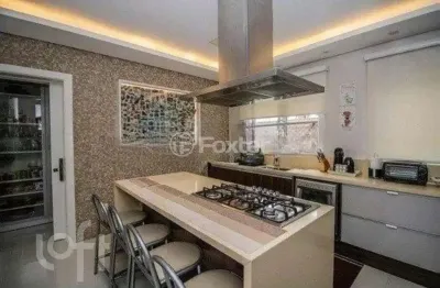 Casa em condomínio fechado com 4 quartos à venda na avenida santos ferreira, 3125, nossa senhora das graças, canoas, 420 m2 por r$ 3.099.000