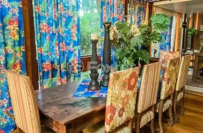 Casa com 7 quartos à venda na rua dos tapuias, 82, espírito santo, porto alegre, 600 m2 por r$ 1.150.000