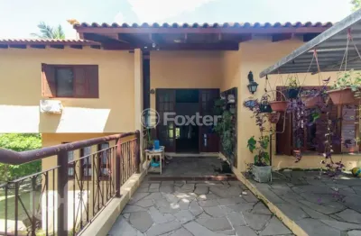 Casa com 4 quartos à venda na Rua Dona Lida Monteiro, 515, Teresópolis, Porto Alegre, 473 m2 por R$ 1.500.000