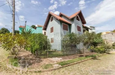 Casa com 4 quartos à venda na rua inês vinhas, 40, espírito santo, porto alegre, 220 m2 por r$ 990.000