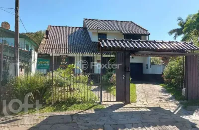 Casa com 3 quartos à venda na rua mura, 60, guarujá, porto alegre, 157 m2 por r$ 680.000
