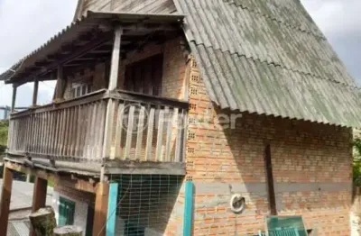 Casa com 3 quartos à venda na rua costa lima, 657, nonoai, porto alegre, 130 m2 por r$ 300.000