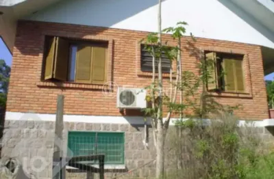 Casa com 3 quartos à venda na estrada kanazawa, 84, vila nova, porto alegre, 300 m2 por r$ 700.000