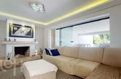 Casa com 4 quartos à venda na Rua Jacundá, 132, Guarujá, Porto Alegre, 240 m2 por R$ 1.615.000