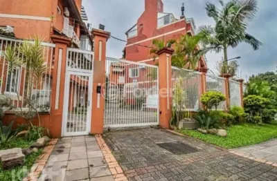 Casa em condomínio fechado com 3 quartos à venda na avenida guaíba, 4400, vila assunção, porto alegre, 248 m2 por r$ 950.000