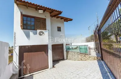 Casa com 4 quartos à venda na avenida edu las-casas, 565, parque santa fé, porto alegre, 237 m2 por r$ 649.000