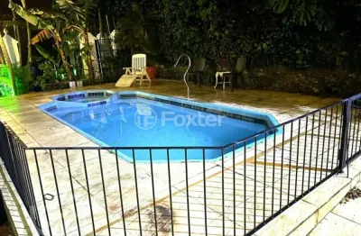 Casa com 3 quartos à venda na avenida guaíba, 4572, vila assunção, porto alegre, 280 m2 por r$ 1.790.000