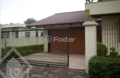 Casa com 4 quartos à venda na rua major sezefredo, 1017, marechal rondon, canoas, 270 m2 por r$ 1.400.000