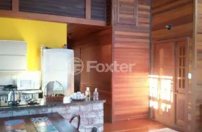 Casa com 3 quartos à venda na rua maurílio ferreira, 370, campo novo, porto alegre, 200 m2 por r$ 310.000