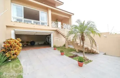 Casa com 3 quartos à venda na rua joaquim cruz, 521, santo antônio, porto alegre, 316 m2 por r$ 1.149.000