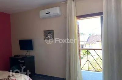 Casa em condomínio fechado com 3 quartos à venda na avenida edgar pires de castro, 2145, hípica, porto alegre, 128 m2 por r$ 530.000