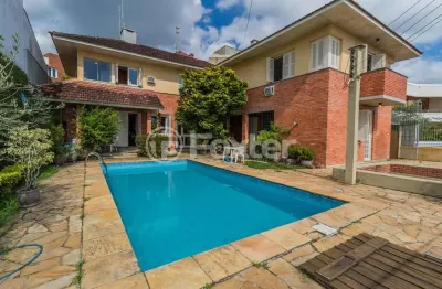 Casa com 5 quartos à venda na rua dona lida monteiro, 80, teresópolis, porto alegre, 445 m2 por r$ 1.500.000