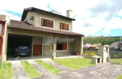 Casa em condomínio fechado com 3 quartos à venda na rua erny ludwig, 135, mário quintana, porto alegre, 270 m2 por r$ 897.000