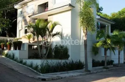 Casa em condomínio fechado com 3 quartos à venda na avenida vicente monteggia, 1020, cavalhada, porto alegre, 240 m2 por r$ 950.000