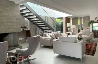 Casa em condomínio fechado com 3 quartos à venda na avenida juca batista, 9000, belém novo, porto alegre, 339 m2 por r$ 4.200.000
