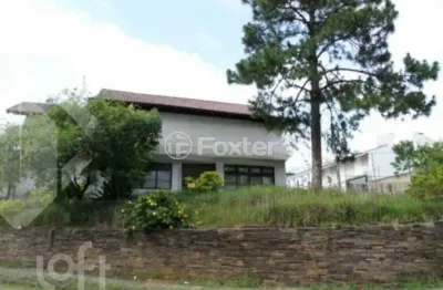 Casa com 4 quartos à venda na rua teixeira de carvalho, 55, medianeira, porto alegre, 550 m2 por r$ 1.650.000