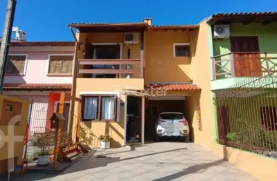 Casa com 3 quartos à venda na rua edgar sanches laurent, 46, hípica, porto alegre, 180 m2 por r$ 750.000