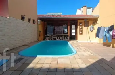 Casa com 3 quartos à venda na Rua Edgar Sanches Laurent, 46, Hípica, Porto Alegre, 180 m2 por R$ 750.000