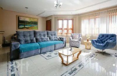 Casa com 3 quartos à venda na rua professor isidoro la porta, 106, jardim itu sabará, porto alegre, 308 m2 por r$ 1.250.000