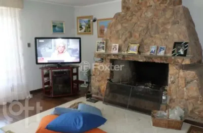 Casa com 4 quartos à venda na rua caeté, 1047, vila assunção, porto alegre, 323 m2 por r$ 1.800.000