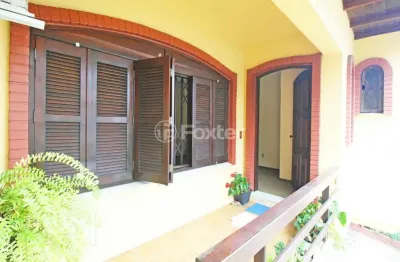 Casa com 3 quartos à venda na rua umbú, 137, passo da areia, porto alegre, 154 m2 por r$ 1.280.000