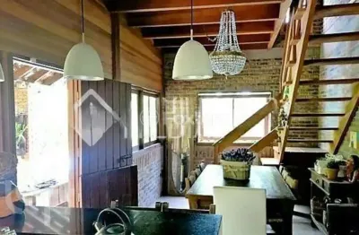 Casa com 5 quartos à venda na rua pedro de oliveira frança, 572, hípica, porto alegre, 270 m2 por r$ 1.200.000