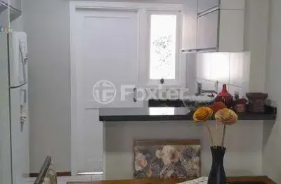 Casa em condomínio fechado com 2 quartos à venda na estrada costa gama, 5124, restinga, porto alegre, 49 m2 por r$ 290.000