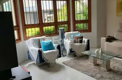 Casa em condomínio fechado com 3 quartos à venda na rua dois mil novecentos e noventa e nove, 356, mário quintana, porto alegre, 200 m2 por r$ 1.200.000