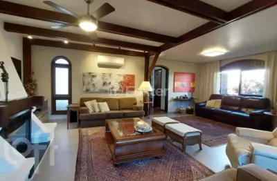 Casa com 3 quartos à venda na rua inhanduí, 252, cristal, porto alegre, 309 m2 por r$ 1.600.000