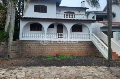 Casa em condomínio fechado com 3 quartos à venda na avenida senador salgado filho, 6863, são lucas, viamão, 300 m2 por r$ 1.000.000