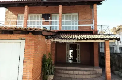 Casa com 3 quartos à venda na rua coronel neves, 472, medianeira, porto alegre, 450 m2 por r$ 1.600.000