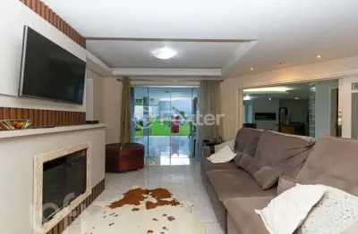 Casa com 4 quartos à venda na rua tupi, 989, igara, canoas, 428 m2 por r$ 1.150.000