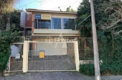 Casa com 4 quartos à venda na Rua Antônio Ribeiro, 321, Santo Antônio, Porto Alegre, 230 m2 por R$ 840.000
