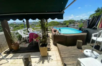 Casa com 3 quartos à venda na rua natércia cunha veloso, 267, morro santana, porto alegre, 270 m2 por r$ 798.000