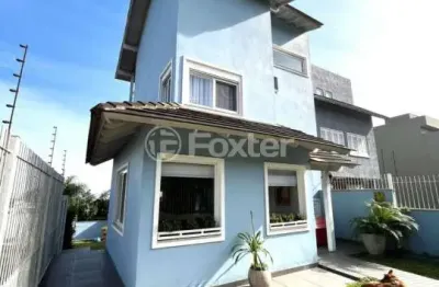 Casa com 3 quartos à venda na rua henrique anawate, 470, guarujá, porto alegre, 137 m2 por r$ 899.500