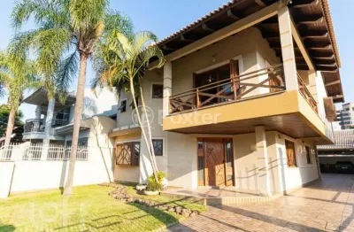 Casa com 4 quartos à venda na rua irmão fernando anatoli, 147, marechal rondon, canoas, 300 m2 por r$ 1.910.000