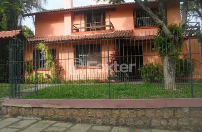 Casa com 5 quartos à venda na rua itapitocaí, 725, cristal, porto alegre, 225 m2 por r$ 1.590.000