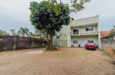 Casa com 3 quartos à venda na rua jerolomo minuzo, 464, vila nova, porto alegre, 331 m2 por r$ 799.000