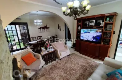 Casa com 3 quartos à venda na avenida coronel gastão haslocher mazeron, 269, medianeira, porto alegre, 280 m2 por r$ 1.050.000