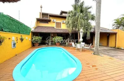 Casa com 3 quartos à venda na avenida orleaes, 492, guarujá, porto alegre, 327 m2 por r$ 1.980.000