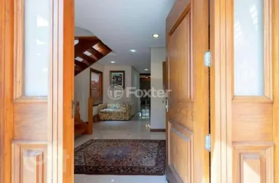 Casa em condomínio fechado com 3 quartos à venda na avenida juca batista, 8000, belém novo, porto alegre, 294 m2 por r$ 1.300.000