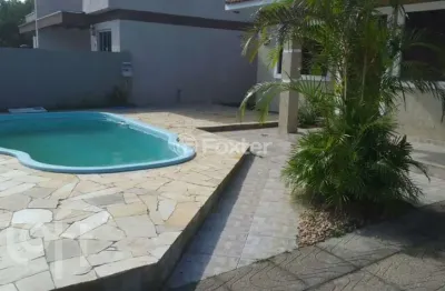 Casa com 3 quartos à venda na rua bolívia, 582, zona norte, capão da canoa, 110 m2 por r$ 650.000