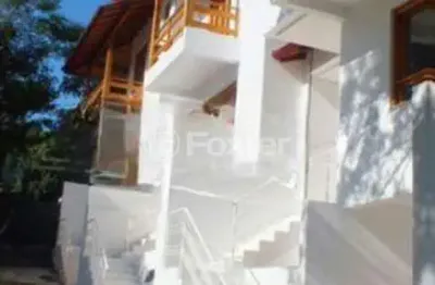 Casa em condomínio fechado com 3 quartos à venda na avenida vicente monteggia, 1669, cavalhada, porto alegre, 131 m2 por r$ 595.000