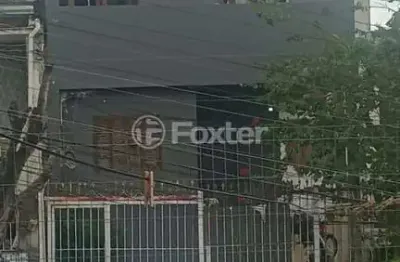 Casa com 4 quartos à venda na Rua Santo Alfredo, 923, Vila São José, Porto Alegre, 160 m2 por R$ 355.000