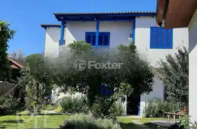 Casa com 3 quartos à venda na rua jacipuia, 317, guarujá, porto alegre, 271 m2 por r$ 721.000