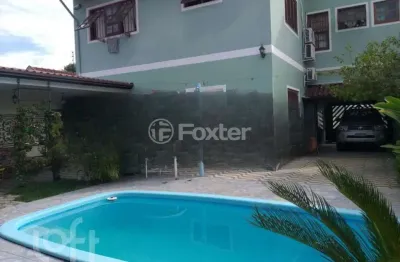Casa com 5 quartos à venda na Rua Doutor Telmo Vergara, 554, Partenon, Porto Alegre, 331 m2 por R$ 1.199.000