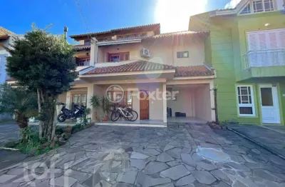 Casa em condomínio fechado com 3 quartos à venda na avenida juca batista, 1458, cavalhada, porto alegre, 153 m2 por r$ 749.000