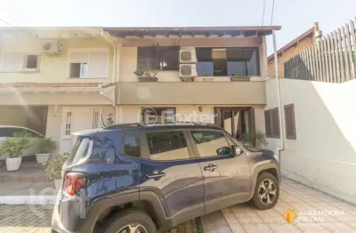 Casa em condomínio fechado com 3 quartos à venda na avenida juca batista, 1490, cavalhada, porto alegre, 167 m2 por r$ 590.000