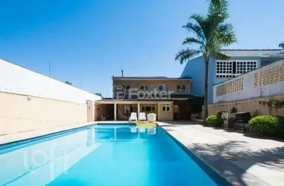 Casa com 4 quartos à venda na avenida saul nonnenmacher, 112, ipanema, porto alegre, 452 m2 por r$ 1.350.000