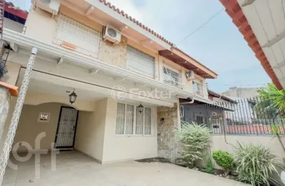 Casa com 3 quartos à venda na rua álvaro domingues, 104, parque santa fé, porto alegre, 91 m2 por r$ 420.000